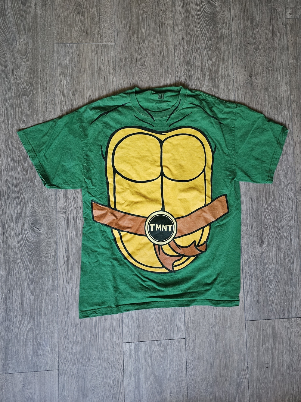 Green Short-Sleeve Graphic Tee with Yellow Shell Print TMNT